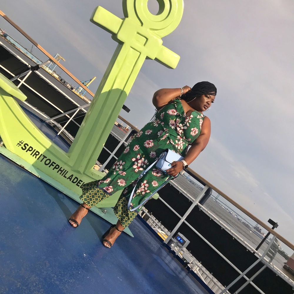 Plus Sized floral jumpsuit with belt